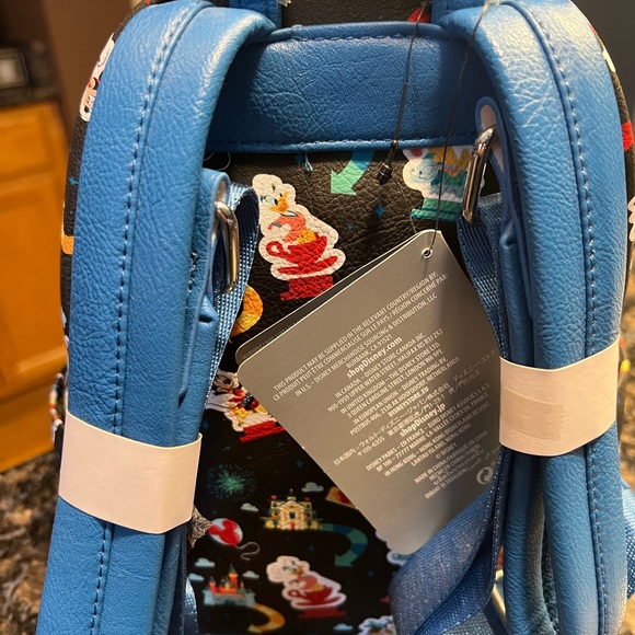 Loungefly Disney Parks Disneyland Ride all over Icon Mini Backpack NWT - Picture 6 of 8